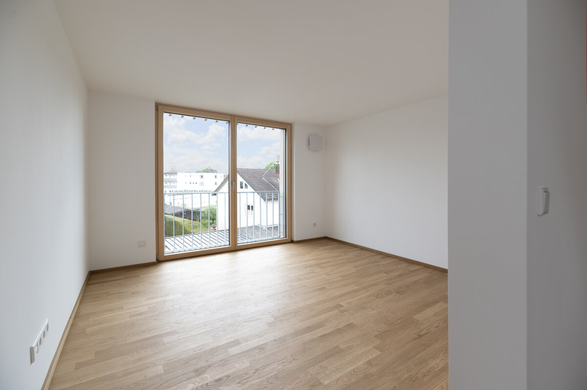 Baufritz_MFH_Haeberle_DG_Wohnung_Wohnzimmer.jpg