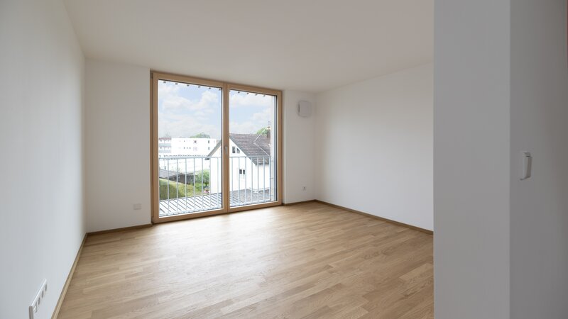 Baufritz_MFH_Haeberle_DG_Wohnung_Wohnzimmer.jpg