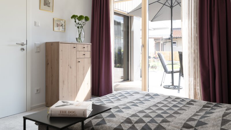 Baufritz_MFH_Haeberle_Wohnung_Haeberle_Schlafzimmer.jpg