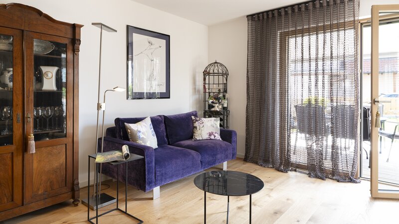 Baufritz_MFH_Haeberle_Wohnung_Haeberle_Wohnzimmer.jpg